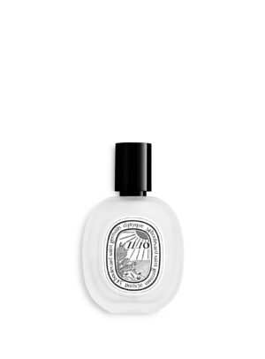Imagen del Hair Mist Ilio de Diptyque, frasco blanco con ilustración en blanco y negro, edición verano 2025 disponible en Papaduk Ibiza