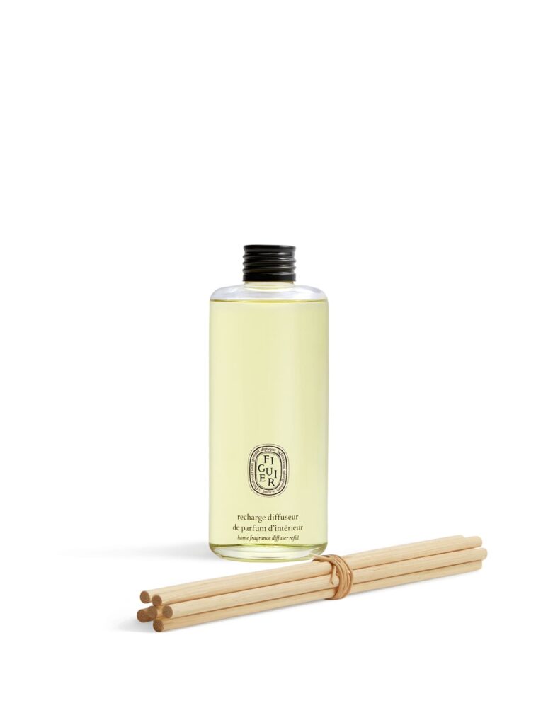 Recarga difusor Diptyque Figuier 200 ml, frasco transparente con líquido amarillo claro y varillas de madera, aroma fresco de higuera.