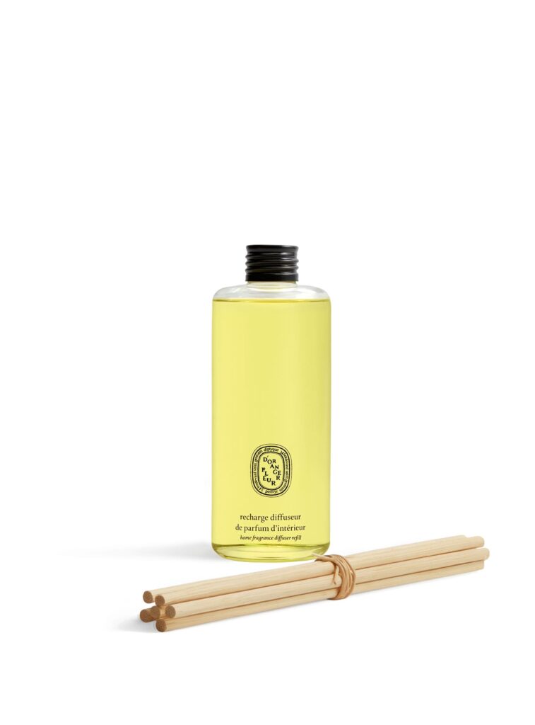 Recarga difusor Diptyque Fleur d’Oranger 200 ml, botella transparente con líquido amarillo y varillas de madera, aroma cítrico de azahar.
