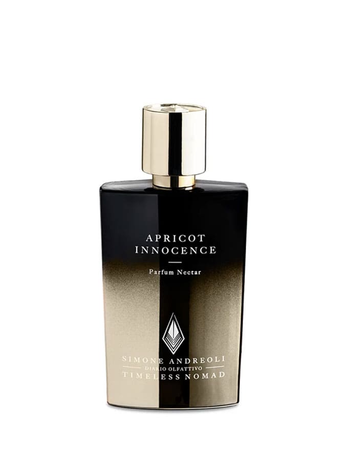 Frasco de perfume Apricot Innocence de Simone Andreoli, botella negra y dorada de 50 ml.