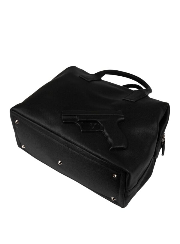 Vista inferior del bolso weekender Vlieger & Vandam con base estructurada y pistola en relieve.
