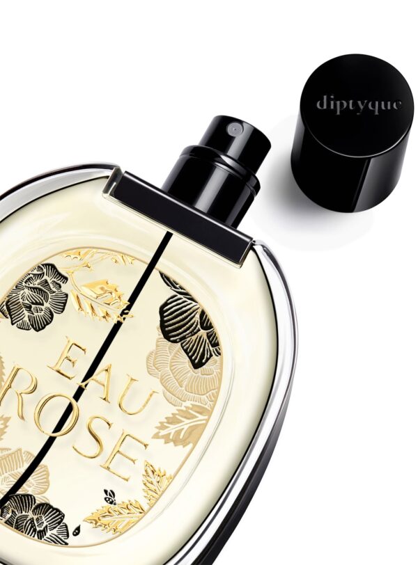 Diptyque Eau Rose EdP 75 ml – frasco abierto con vaporizador negro y detalles dorados de pétalos grabados.