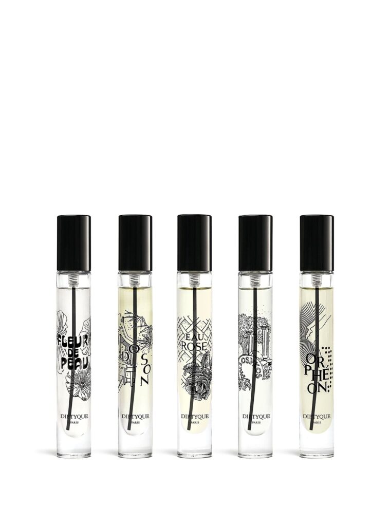 Diptyque Coffret Eau de Parfum Navidad 2025 – cinco mini frascos transparentes con tapón negro, diseño minimalista.