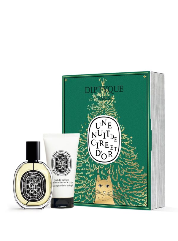 Diptyque Surprise Book Set Navidad 2025 – caja verde con ilustración de gato y árbol dorado, incluye perfume Orphéon y gel de manos.