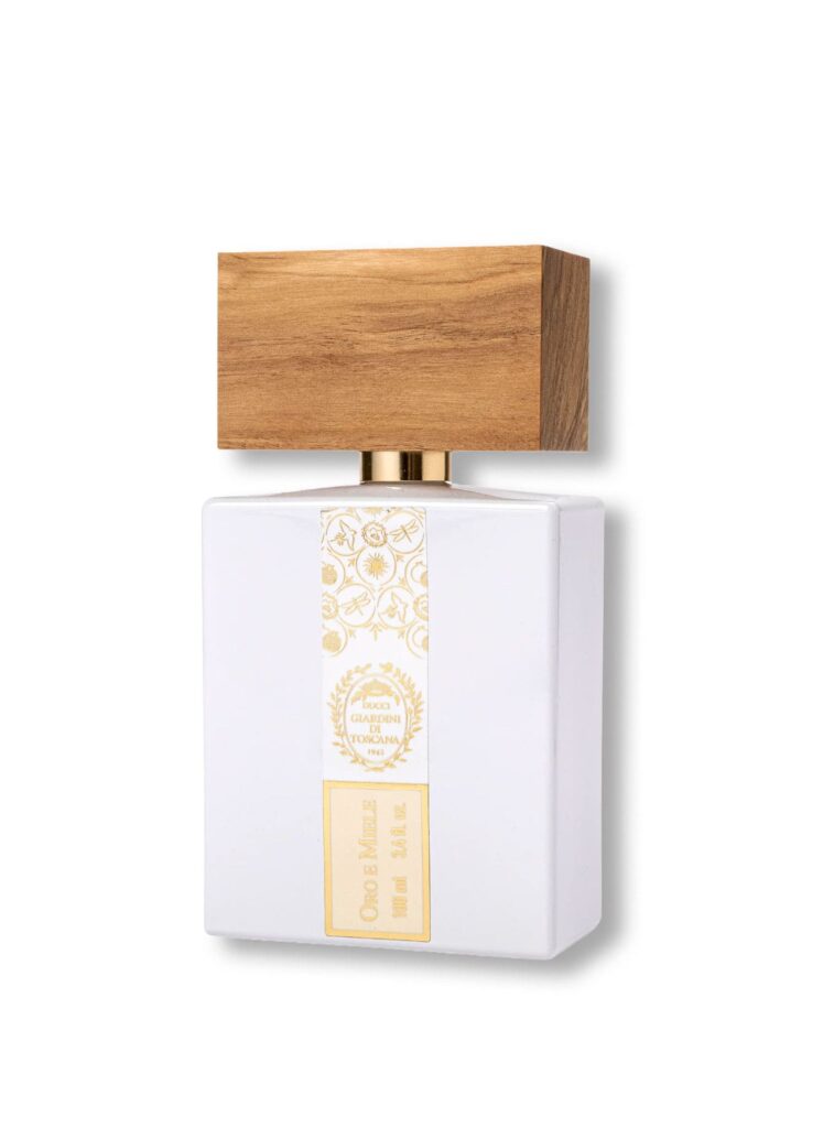 Perfume Oro e Miele de Giardini di Toscana 100 ml, fragancia nicho en frasco blanco con tapón efecto madera y detalles dorados.